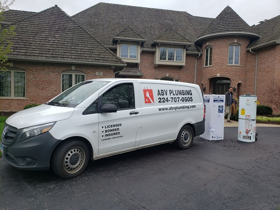 Plumbing vehicle in front of the house, Chicago, IL